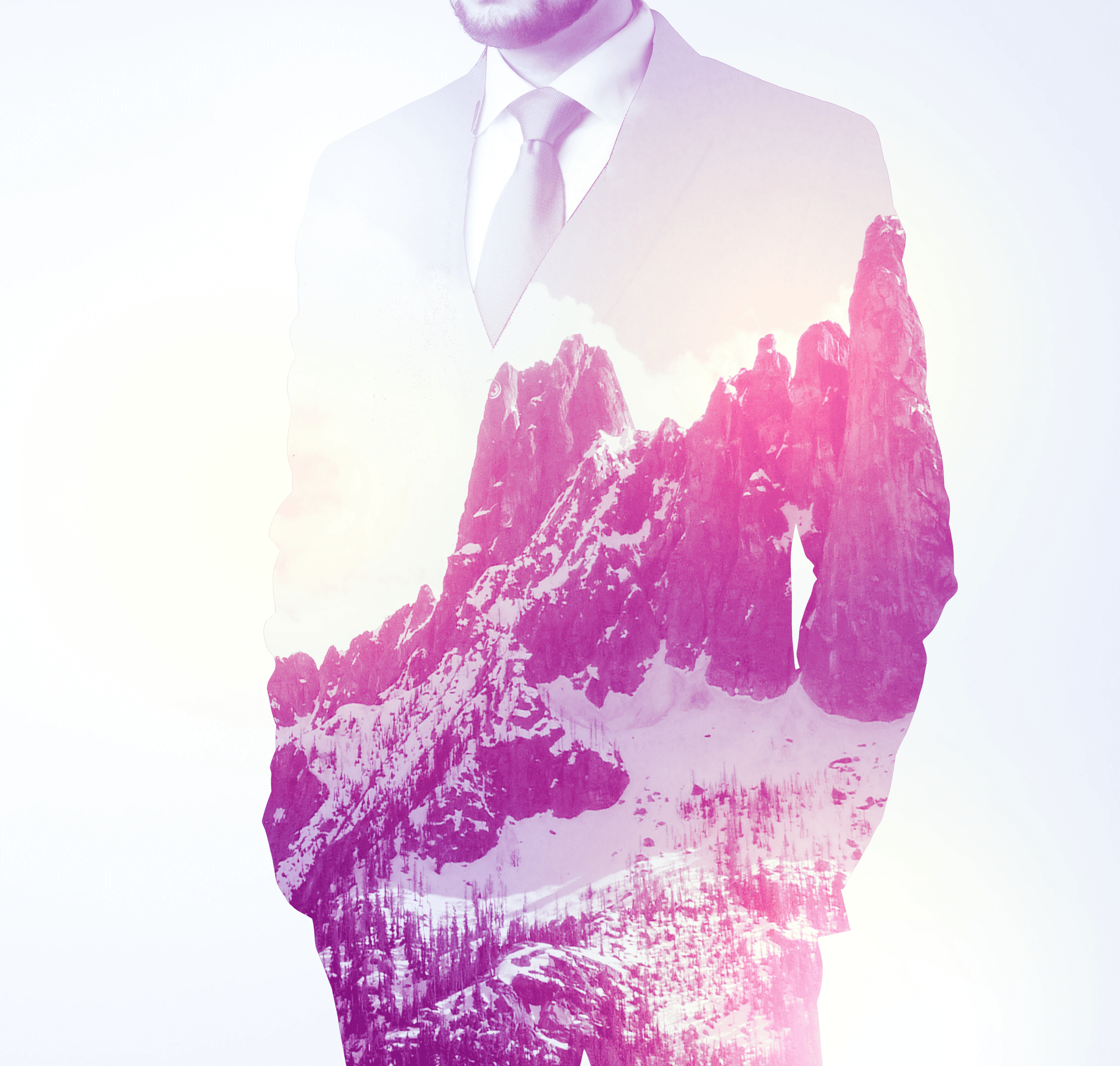Silhouette of man with aspirational mountain scene